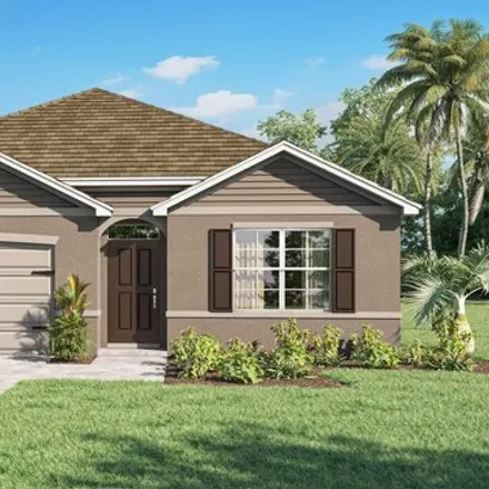 Buy this 4 bed house on Garrett Street Southwest in Palm Bay, FL 32908