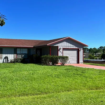 Rent this 3 bed house on 531 Southwest Twigg Avenue in Port Saint Lucie, FL 34983