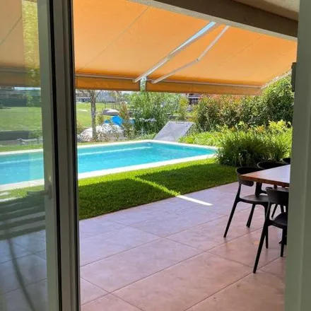 Rent this 5 bed house on Avenida Santiago de Liniers 1303 in Partido de Tigre, B1648 DAZ Rincón de Milberg