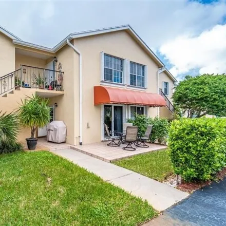 Rent this 2 bed condo on 429 Waterside Drive in Hypoluxo, Palm Beach County