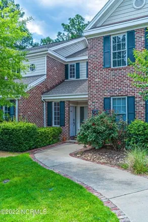 Rent this 2 bed townhouse on 1711 Woodbrooke Drive in Southern Pines, NC 28387