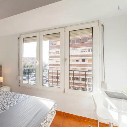 Rent this 6 bed room on Avinguda del Primat Reig in 63, 46019 Valencia