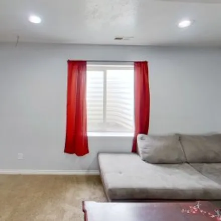 Rent this 5 bed apartment on 7708 North Wyatt Earp Avenue