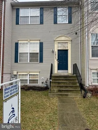 Rent this 4 bed townhouse on 1607 Benoli Court in Seven Oaks, Odenton