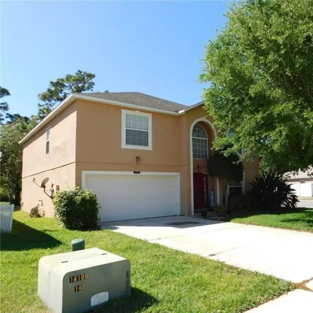 Buy this 4 bed house on Rocking Chair Drive in Titusville, FL 32781