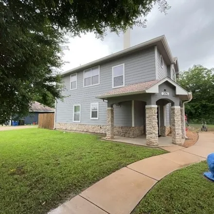 Rent this 3 bed house on 215 College Street in Hutto, TX 78634