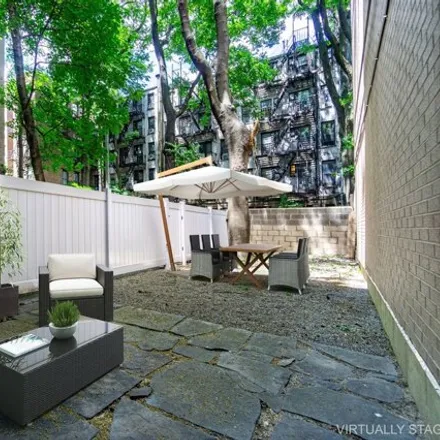 Rent this studio house on 319 E 5th St Apt C in New York, 10003
