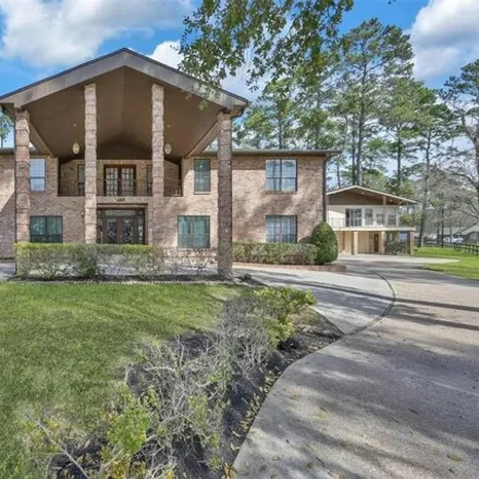 Buy this 7 bed house on 14436 Charred Oaks in Montgomery County, TX 77318