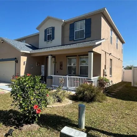 Buy this 4 bed house on 2837 Paunes Prairie Circle in Osceola County, FL 34743