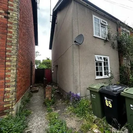 Rent this 2 bed townhouse on 69 Denzil Road in Guildford, GU2 7NQ