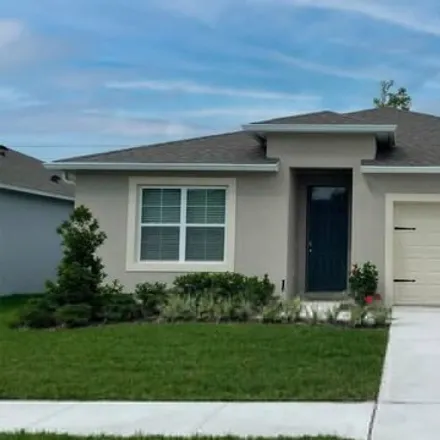 Buy this 4 bed house on 2855 Waterlily Way in Poinciana, Florida