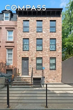 Buy this 4 bed townhouse on 65 Bainbridge Street in New York, NY 11233