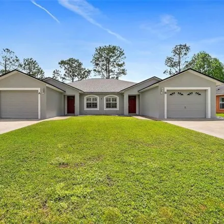 Buy this 6 bed house on 16 Pine Hill Lane in Palm Coast, FL 32164