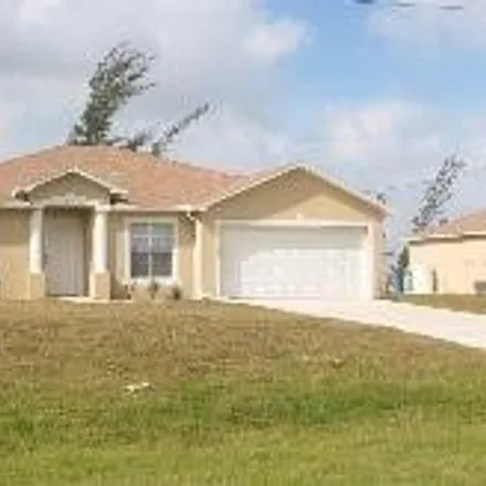 Rent this 3 bed house on 1122 Northwest 24th Place in Cape Coral, FL 33993