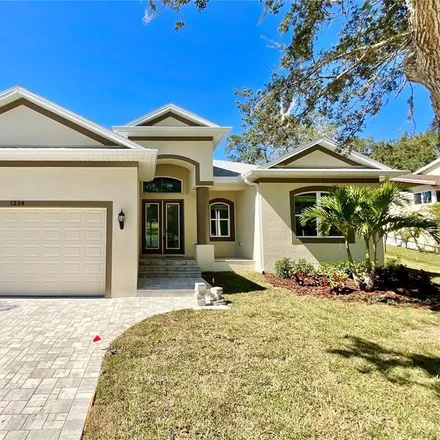Rent this 3 bed house on 1334 Belcher Drive in Tarpon Springs, FL 34689