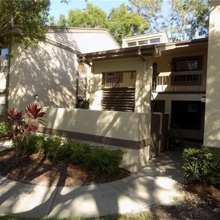 Rent this 2 bed condo on 101 Woodlake Wynde in Palm Harbor, FL 34677
