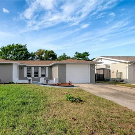 Buy this 3 bed house on 7727 Foxbloom Drive in Bayonet Point, FL 34668