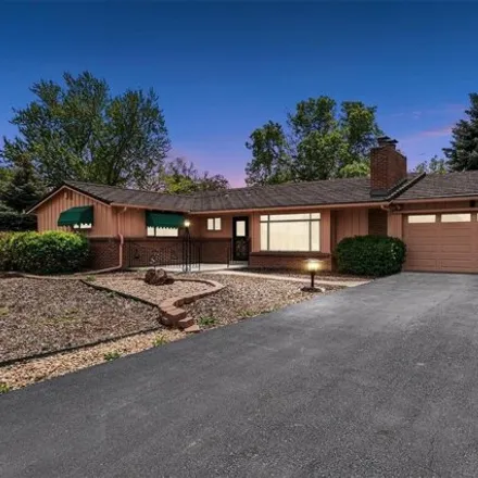 Buy this 4 bed house on 10490 West 35th Avenue in Wheat Ridge, CO 80033