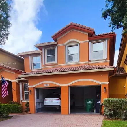 Buy this 4 bed townhouse on 11455 Northwest 83rd Way in Doral, FL 33178