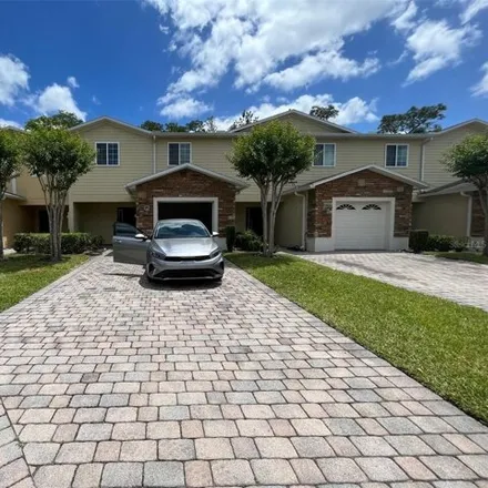 Rent this 3 bed house on 2165 Cypress Villas Drive in Orange County, FL 32825