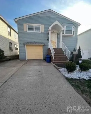 Rent this 4 bed house on 29 Louis Street in Carteret, NJ 07008