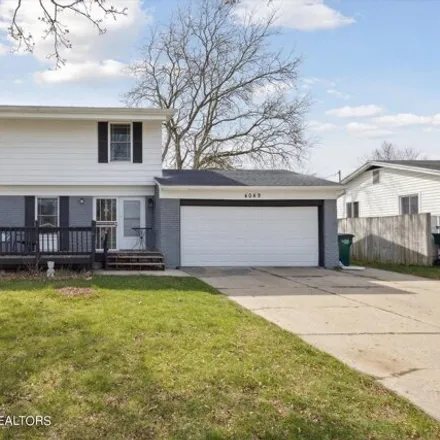 Buy this 4 bed house on 4049 Sheffield Boulevard in Lansing, MI 48911