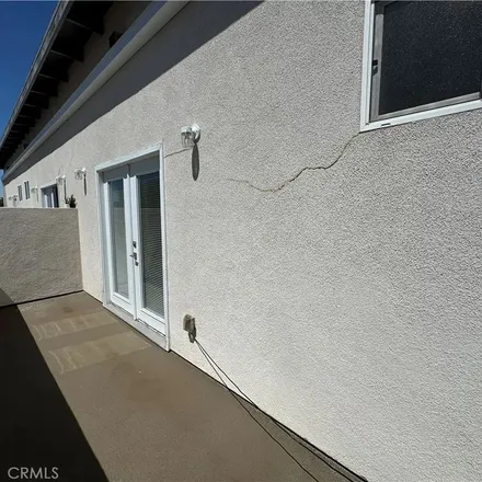Rent this 3 bed townhouse on 22503 Del Valle Street in Los Angeles, CA 91364