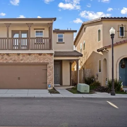 Buy this 3 bed townhouse on unnamed road in Fresno, CA 93707