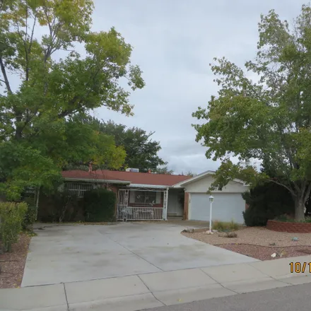 Buy this 4 bed house on 7017 Kiowa Avenue Northeast in Albuquerque, NM 87110