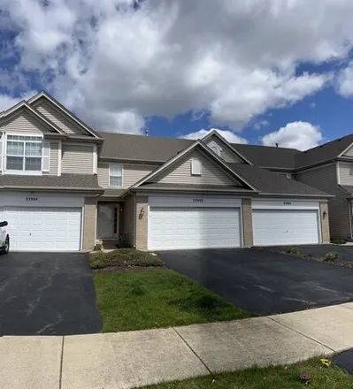 Rent this 3 bed townhouse on 23880 McMullen Circle in Plainfield, IL 60586