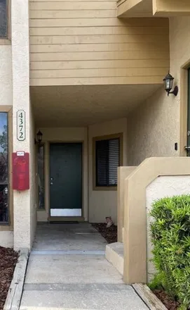 Rent this 2 bed condo on Middlebrook Road in Orlando, FL 32811