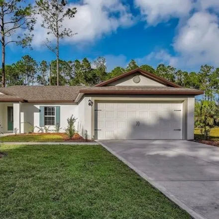 Buy this 3 bed house on 58 Slipper Flower Path East in Palm Coast, FL 32164