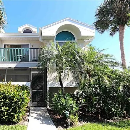 Rent this 2 bed condo on 50 Emerald Woods Dr Apt A5 in Naples, Florida