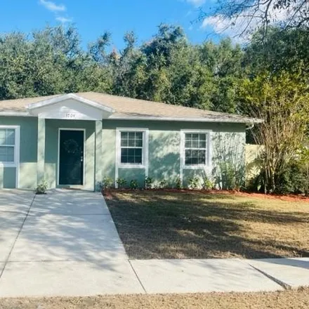 Buy this 4 bed house on 1708 Green Ridge Road in Clair-Mel City, FL 33619
