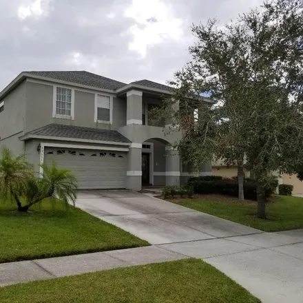 Rent this 4 bed house on 13131 Coldwater Loop in Lake County, FL 34711
