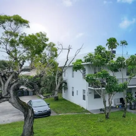 Buy this 8 bed house on 910 Foresteria Drive in Lake Park, Palm Beach County