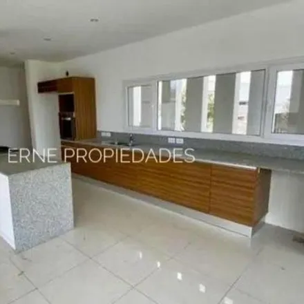 Buy this 3 bed house on Avenida Jorge Newbery in Bosque de Peralta Ramos, B7603 DRT Mar del Plata