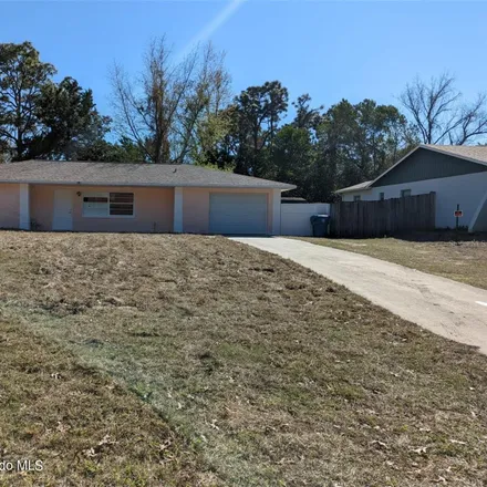 Buy this 3 bed house on 12116 Lamont Drive in Spring Hill, FL 34608