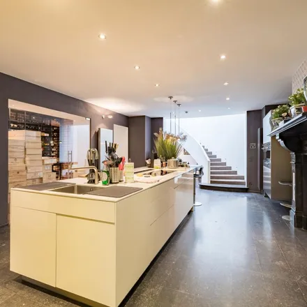 Rent this 4 bed apartment on Rue de Belle Vue - Bellevuestraat 48 in 1050 Brussels, Belgium