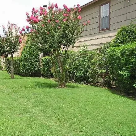 Rent this 2 bed condo on 9113 Country Creek Drive in Houston, TX 77036
