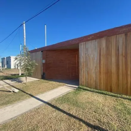 Buy this 3 bed house on Calle 10 in Partido de La Plata, 1896 City Bell