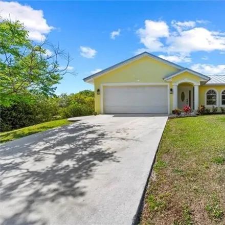 Buy this 3 bed house on 724 Northeast 10th Avenue in Jensen Beach, FL 34957