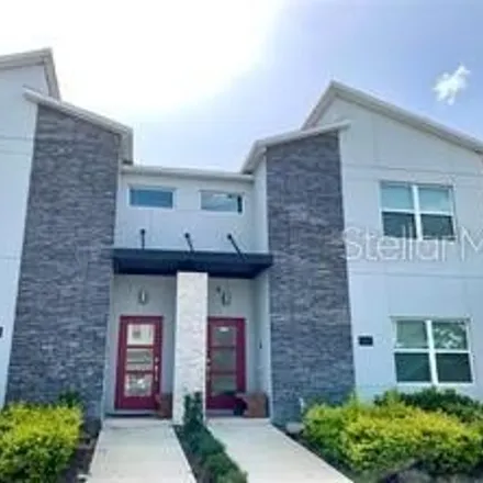 Buy this 4 bed townhouse on Pebble Beach Drive in Osceola County, FL 33897