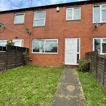 Rent this 4 bed townhouse on Hyde Park Close in Leeds, LS6 1SF