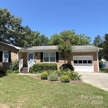 Rent this 3 bed house on 232 Pokeberry Trail in Scaleybark, NC 28027