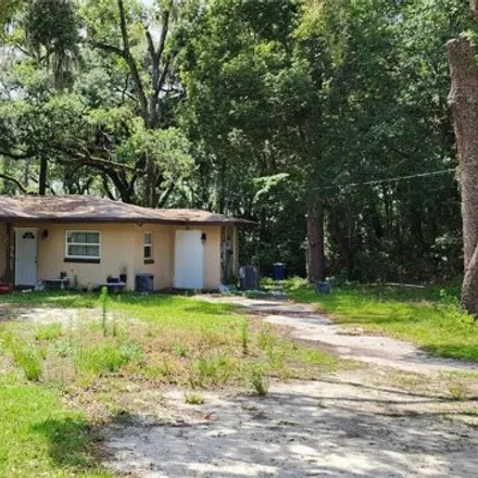 Buy this 2 bed house on 2452 Northeast 49th Avenue in Marion County, FL 34470
