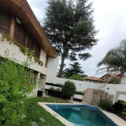 Buy this 5 bed house on El Yacaré in Partido de La Matanza, B1778 FQA Ciudad Evita