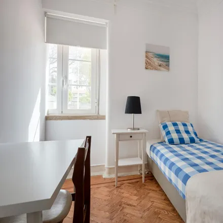 Rent this 7 bed room on Rua João de Menezes 13 in 1900-179 Lisbon, Portugal