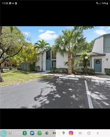 Rent this 2 bed townhouse on Extra Space Storage in 7795 West Sunrise Boulevard, Sunrise Heights