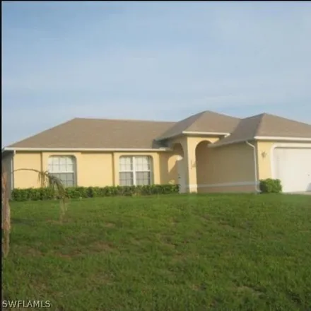 Rent this 3 bed house on 2516 NW 14th Pl in Cape Coral, Florida